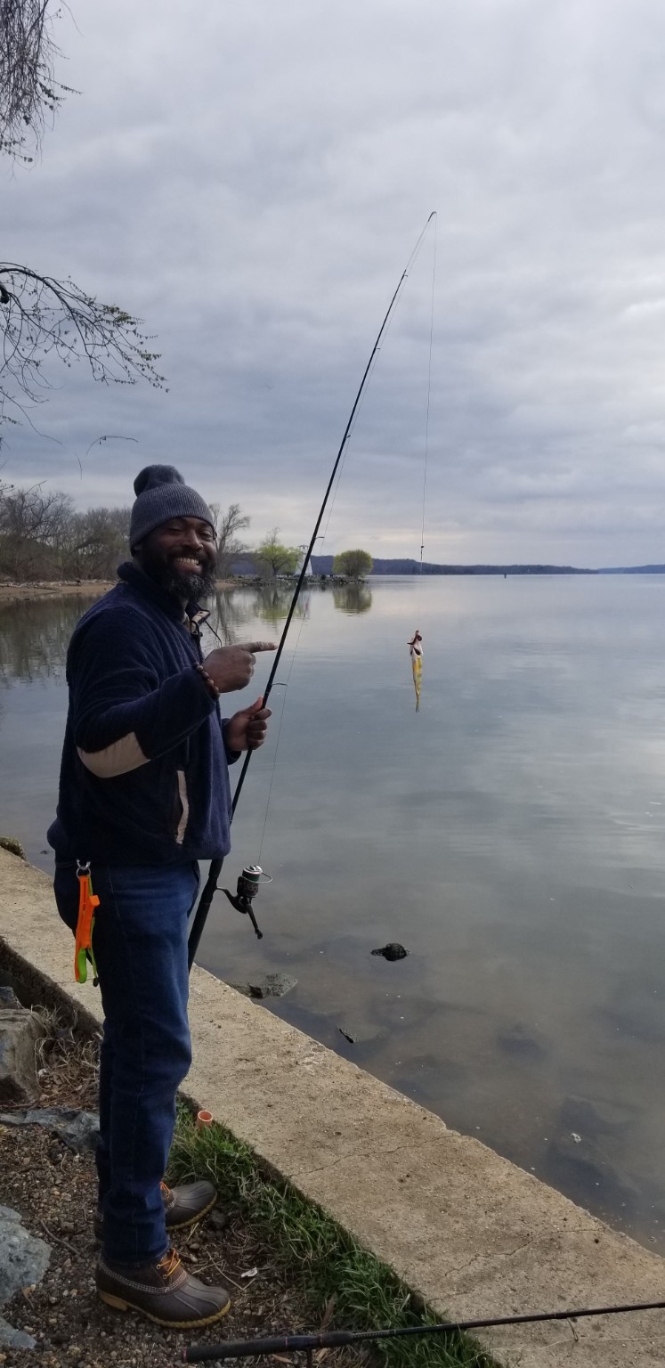 William Storm enjoying a quiet day fishing by the lake